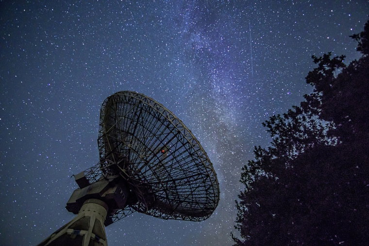 white-satellite-dish-under-blue-sky-during-night-time.jpg white satellite dish under blue sky during night time